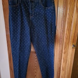 Jeans with "bling". Rhinestones adorn the legs of these size 12 jeans.